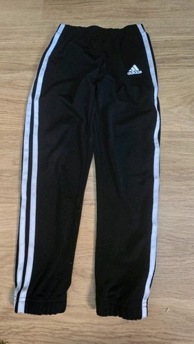Adidas track pants featuring